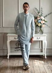 This Columbia Blue men's Prince Coat suit with a touch of embellishment is a conscious choice for men who prioritize quality and distinctive style.