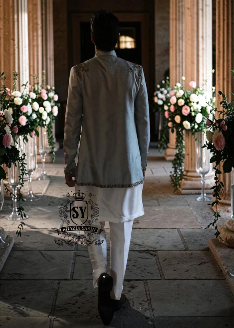 A refined wedding Prince suit with a bold personality. The Luxury lines, and mandarin collar lend a unique and sophisticated elegance, perfect for those who want to stand out in style on their most important day.