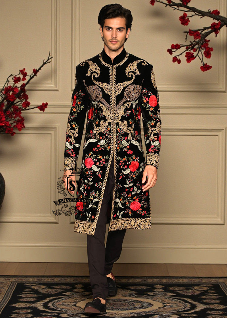 A Velvet sherwani crafted with refined detailing and florals elegance designed for the groom who lets craftsmanship speak louder than trends.