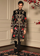 A Velvet sherwani crafted with refined detailing and florals elegance designed for the groom who lets craftsmanship speak louder than trends.