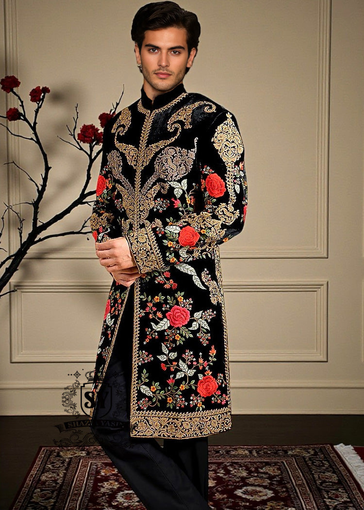 A Velvet sherwani crafted with refined detailing and florals elegance designed for the groom who lets craftsmanship speak louder than trends.
