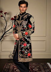 A Velvet sherwani crafted with refined detailing and florals elegance designed for the groom who lets craftsmanship speak louder than trends.