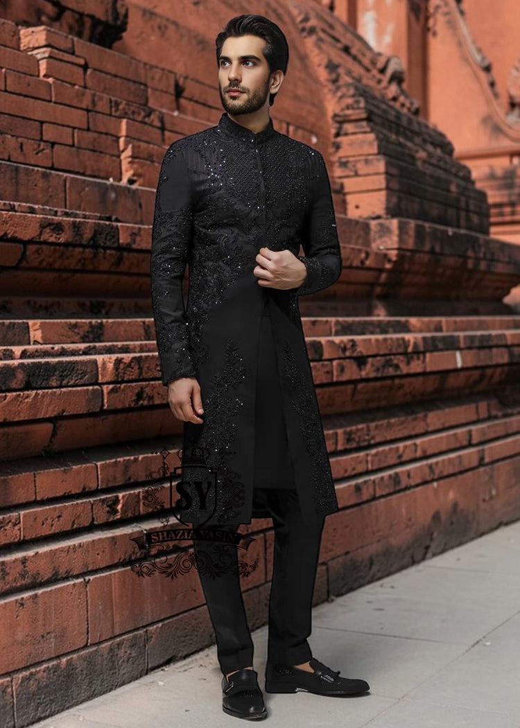 Discover the magic of black in our new sherwani suit—the perfect blend of understated elegance and touch of sophistication. Black doesn't just slim and add luxury: it creates an aura of mystery that draws eyes and sets hearts racing.
