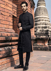 Discover the magic of black in our new sherwani suit—the perfect blend of understated elegance and touch of sophistication. Black doesn't just slim and add luxury: it creates an aura of mystery that draws eyes and sets hearts racing.