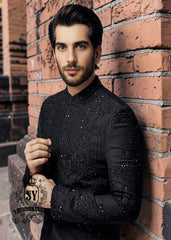 Discover the magic of black in our new sherwani suit—the perfect blend of understated elegance and touch of sophistication. Black doesn't just slim and add luxury: it creates an aura of mystery that draws eyes and sets hearts racing.