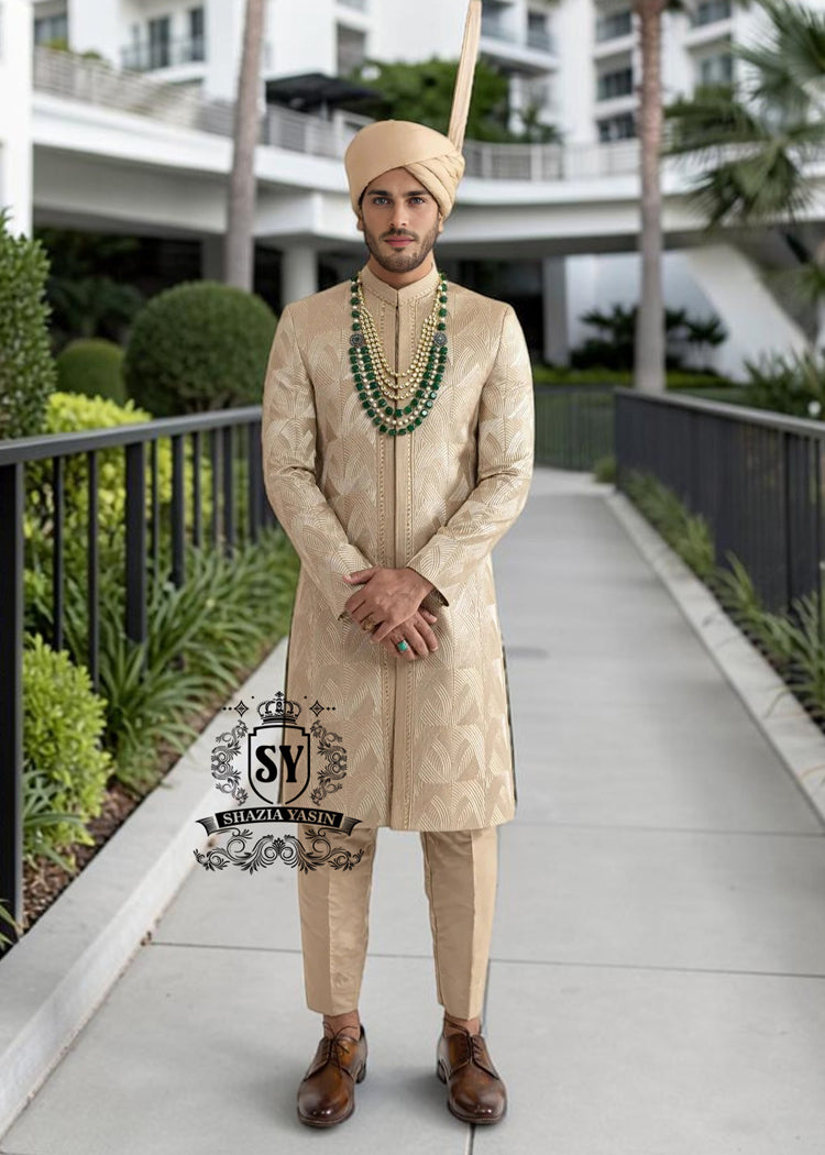 In the grandeur of royal legacy, this Taupe Gold sherwani stands as a tribute to timeless nobility. Handcrafted with intricate embroidery that echo strength and majesty, it glimmers with the delicate artistry of sequins, Swarovski crystals. A creation where tradition meets elegance - designed for the groom who carries the spirit of heritage with the poise of modern royalty.