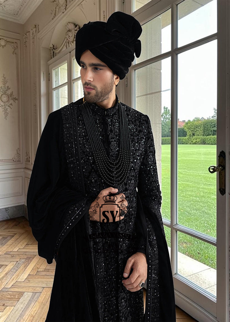  The Full Hand-Embroidered Black Sherwani is a masterpiece of couture, created for the groom who wishes to embody elegance, power, and tradition. Hand embroidery adorns the sherwani in lavish detail, transforming it into a regal statement piece. 
