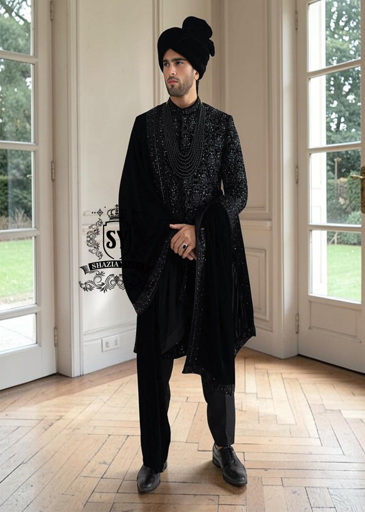 The Full Hand-Embroidered Black Sherwani is a masterpiece of couture, created for the groom who wishes to embody elegance, power, and tradition. Hand embroidery adorns the sherwani in lavish detail, transforming it into a regal statement piece. 