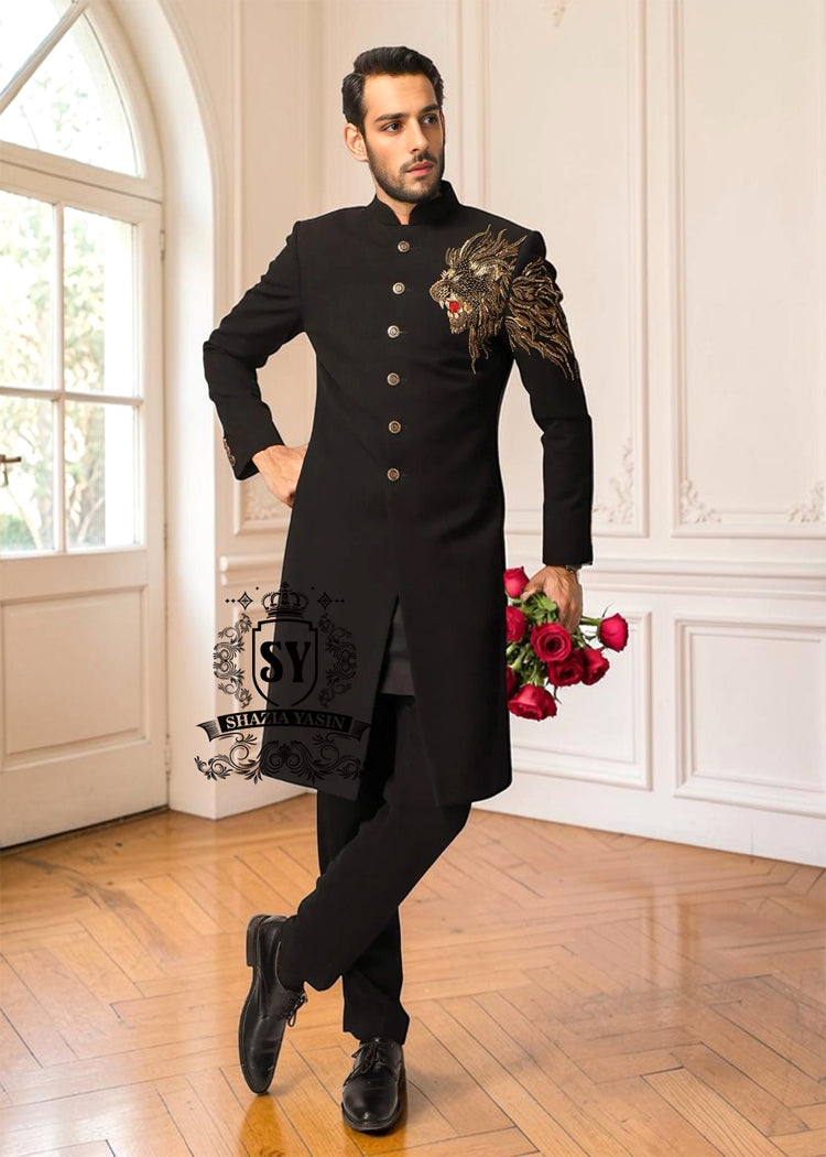 The Black Sherwani jacket, large hand-embellished with refined lion King design workmanship, adds brightness and exclusivity to the entire outfit. The mandarin collar with jeweled buttons adds a modern and elegant touch, perfect for those who want to stand out with class and personality.