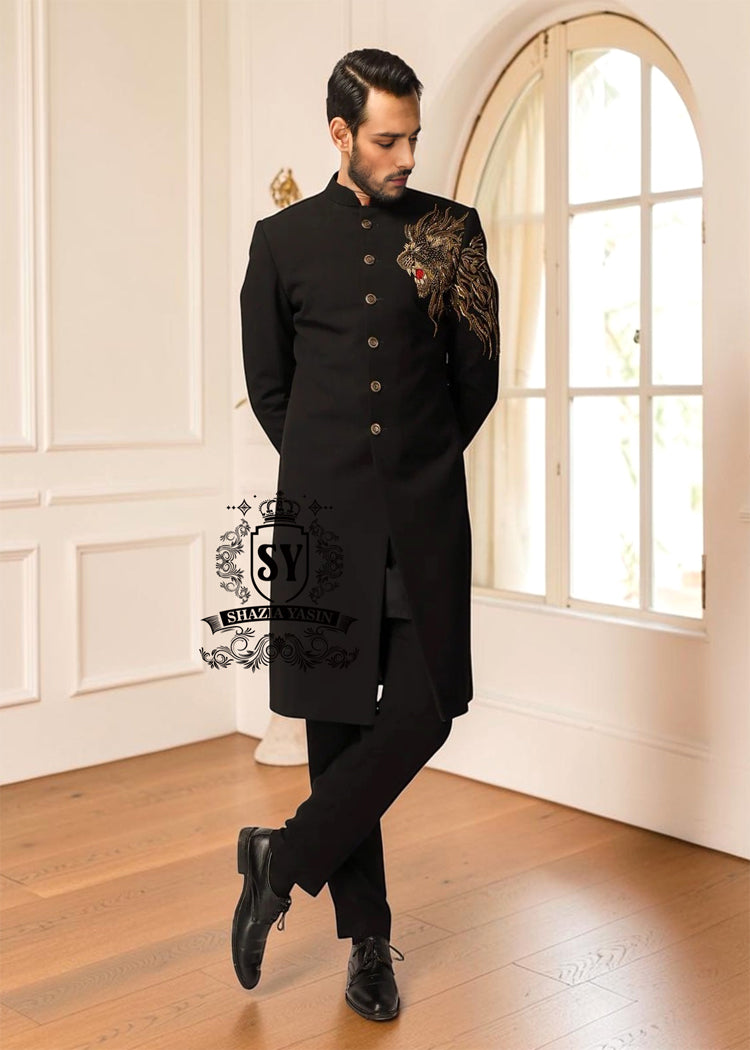 The Black Sherwani jacket, large hand-embellished with refined lion King design workmanship, adds brightness and exclusivity to the entire outfit. The mandarin collar with jeweled buttons adds a modern and elegant touch, perfect for those who want to stand out with class and personality.