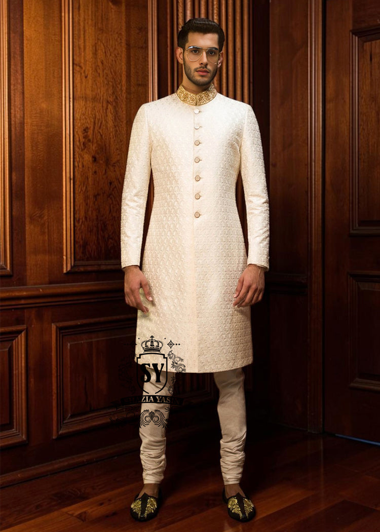 Elegant, slim-fit Off-White men's wedding Sherwani suit. A modern men's formal Sherwani suit perfect for contemporary weddings, stylish ceremonies, elegant Nikah events, and special occasions.