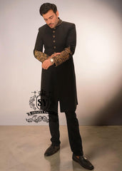 Draped in royalty. Tailored for the spotlight. Black Sherwani elegance elevated with intricate hand embroidery and timeless detailing.