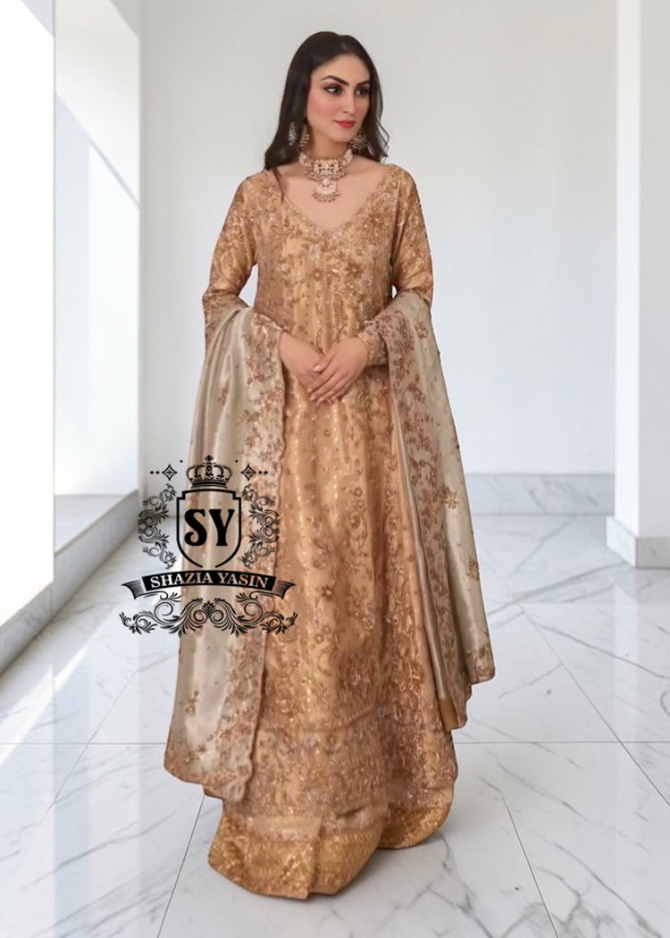 Our radiant Bride shining in the elegant angrakha pishwan, crafted from luxurious silky lame and adorned with exquisite embellishments.⁠ Let this gold outfit accentuate your captivating beauty!
