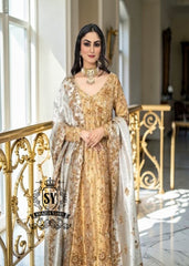 Our radiant Bride shining in the elegant angrakha pishwan, crafted from luxurious silky lame and adorned with exquisite embellishments.⁠ Let this gold outfit accentuate your captivating beauty!