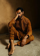 The pure elegance embodied in a Embellished waistcoat—a embroidered kurta pajama suit tailored for the groom basking in the spotlight.