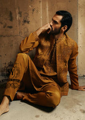 The pure elegance embodied in a Embellished waistcoat—a embroidered kurta pajama suit tailored for the groom basking in the spotlight.