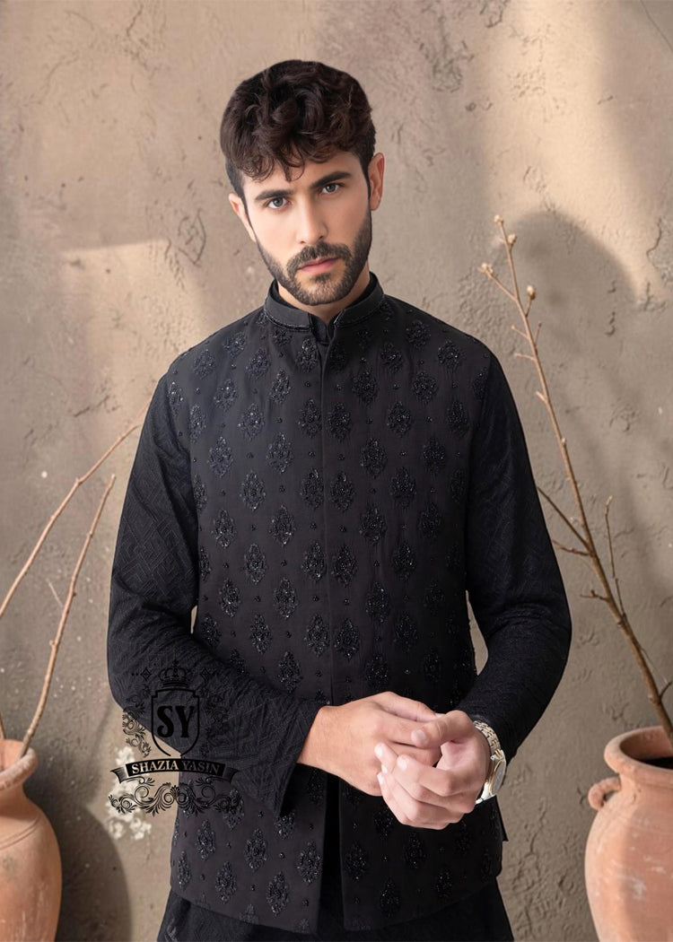 Elevate your men's style to new heights with exquisite men's regal embellished black waistcoat with kurta pajama set. Expertly crafted to make an impact on any special occasion.