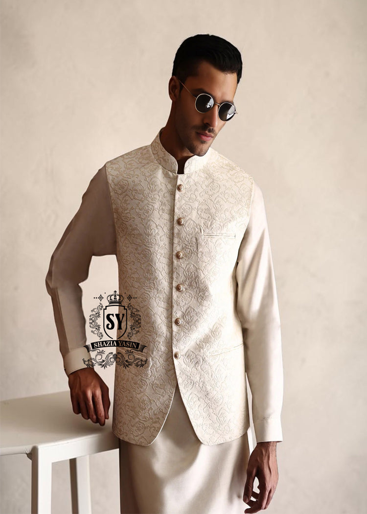 Elevate your look with this dazzling Off-White men's waistcoat. The Off-White self-embroidery adds a touch of luxury and sophistication. Perfect for any occasion, from Nikah to formal events and weddings, this waistcoat is sure to turn heads.