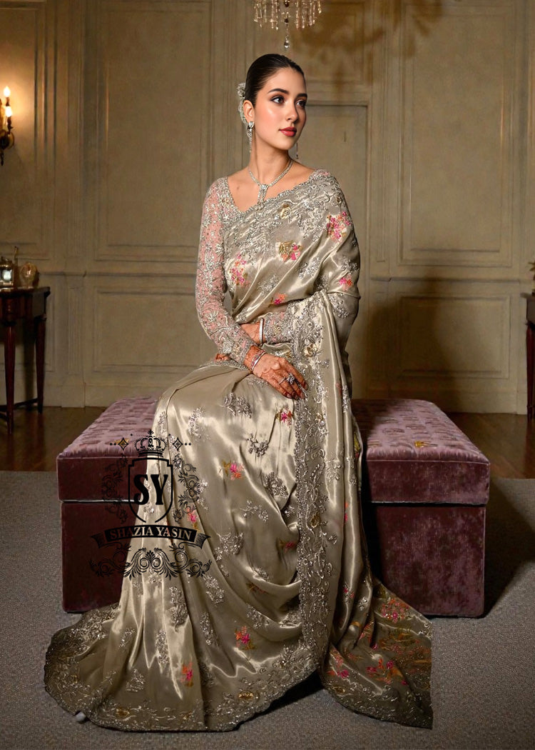 Designer Couture Saree Wedding dress with an open Back Blouse adorned with 3D flowers and a soft pleated Saree
