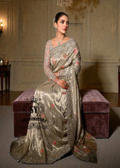 Designer Couture Saree Wedding dress with an open Back Blouse adorned with 3D flowers and a soft pleated Saree