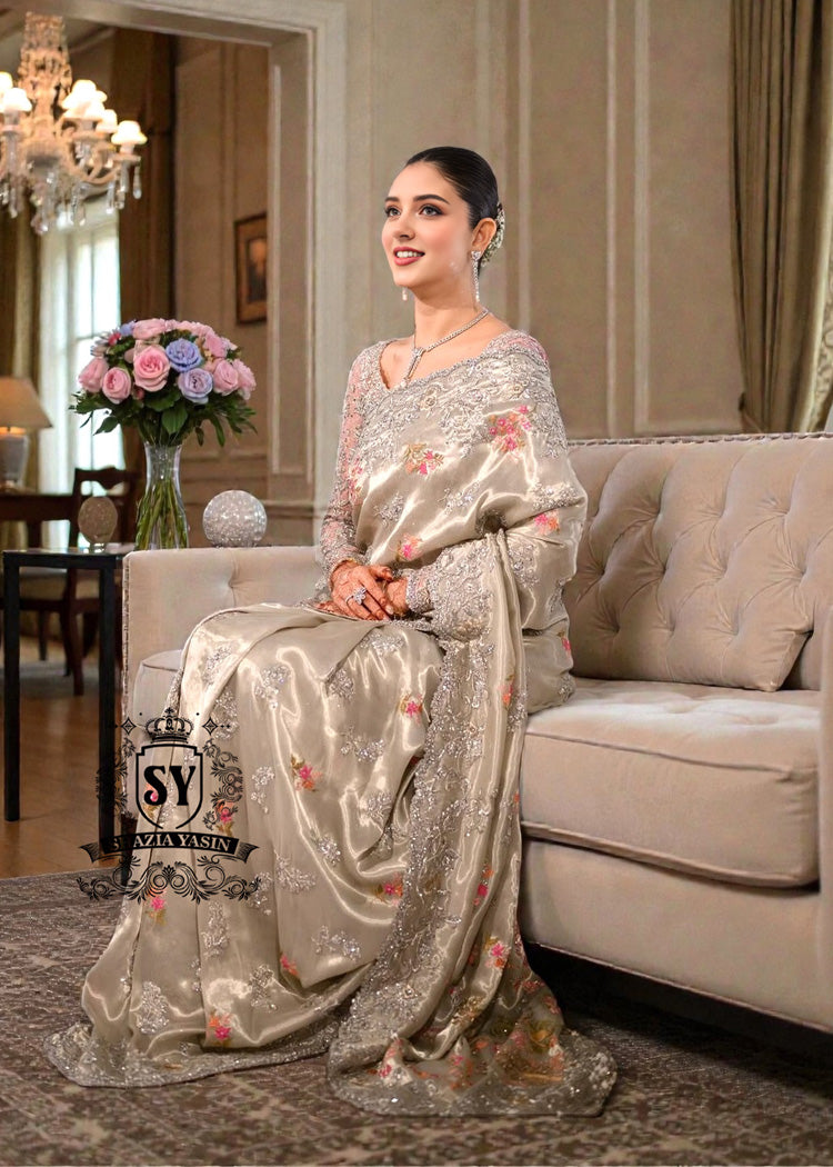 Designer Couture Saree Wedding dress with an open Back Blouse adorned with 3D flowers and a soft pleated Saree