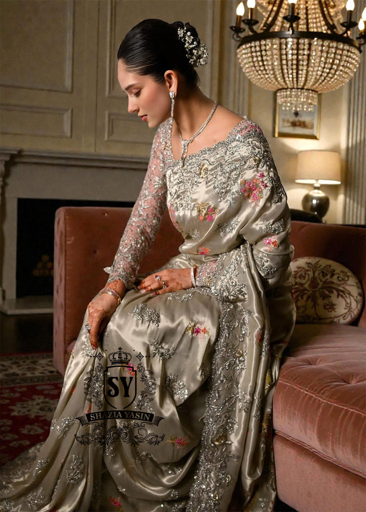 Designer Couture Saree Wedding dress with an open Back Blouse adorned with 3D flowers and a soft pleated Saree